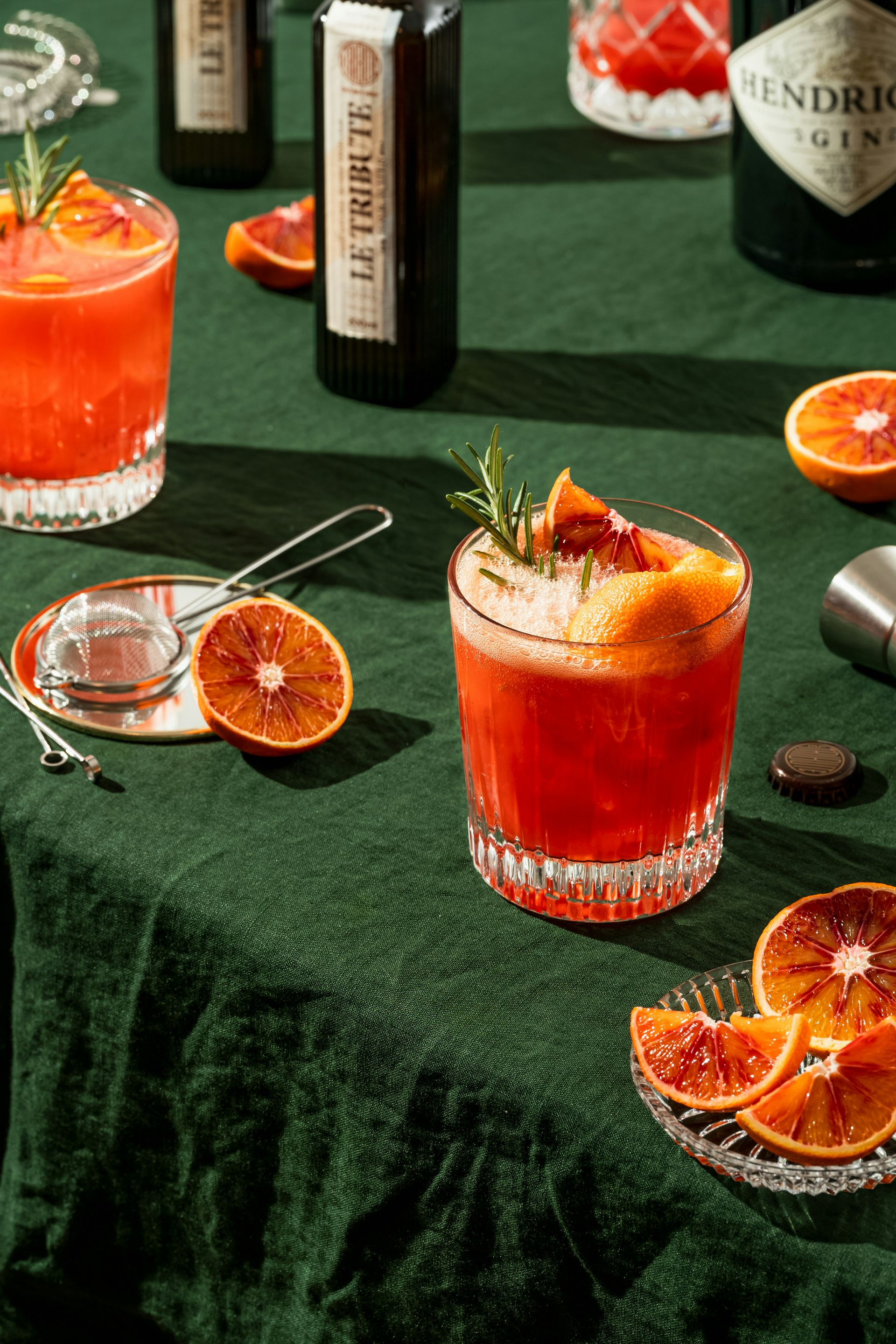 a glass of orange juice on a table