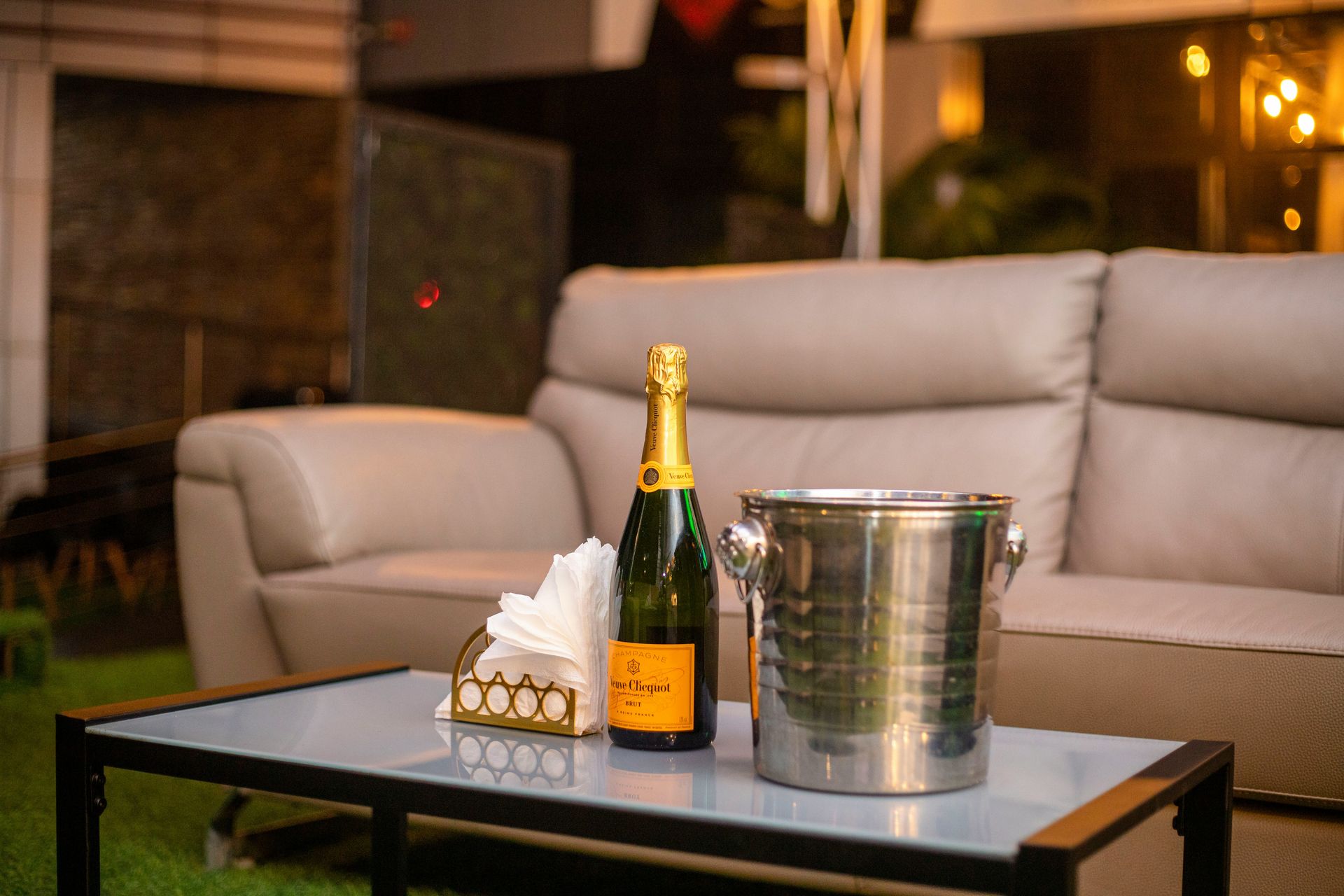 a bottle of wine and a glass on a table
